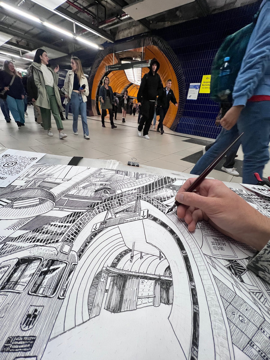 Dip pen in the U-Bahn, Munich – Heiner Radau, Travel & Draw Munich