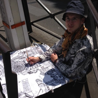 Heiner drawing on the streets of paris