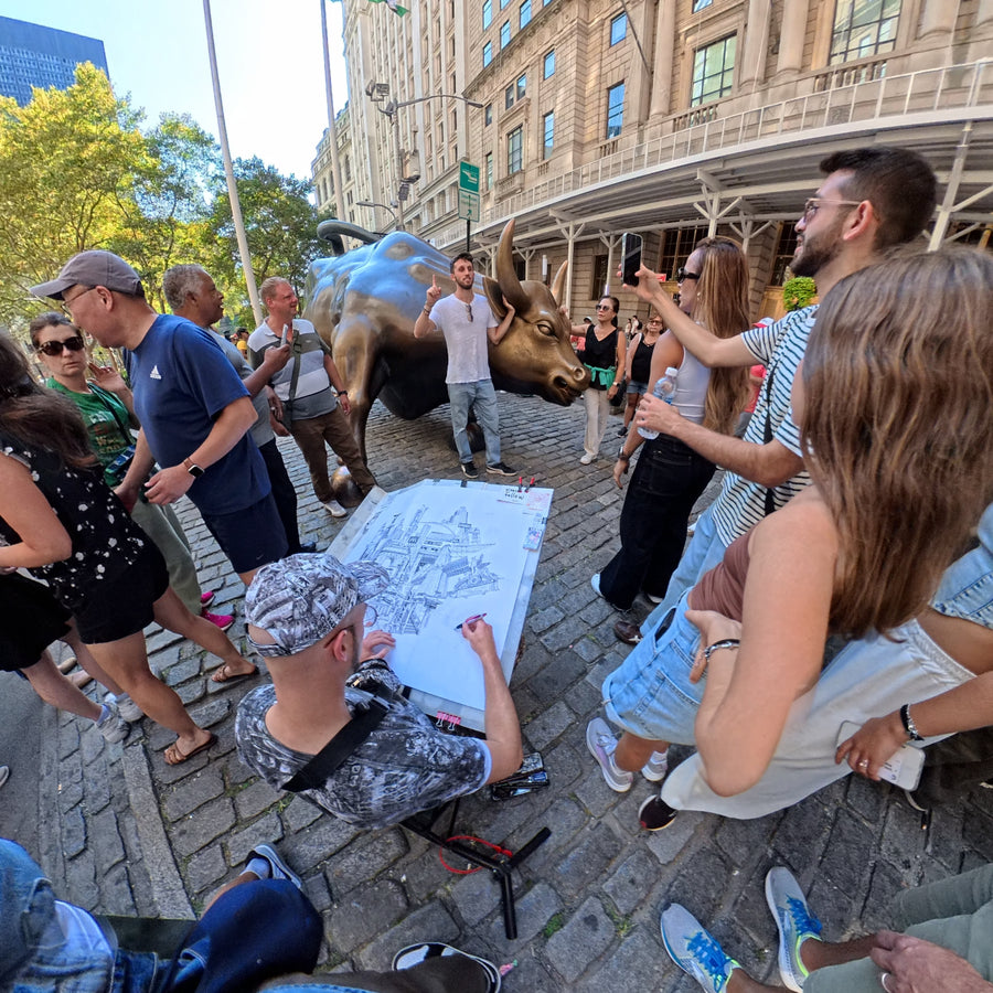 Heiner Radau drawing the NYC artwork on location near the Charging Bull on Wall Street in Lower Manhattan.