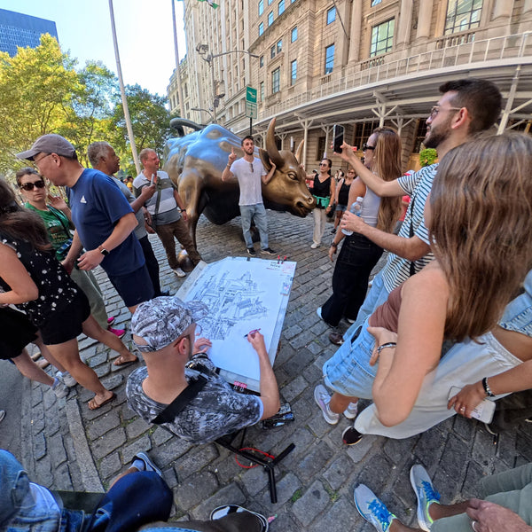Heiner Radau drawing the NYC artwork on location near the Charging Bull on Wall Street in Lower Manhattan.