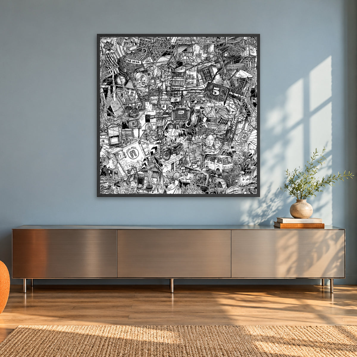 Hanoi fine art poster 100 × 100 cm in a black wood frame in a sunlit loft with an orange armchair