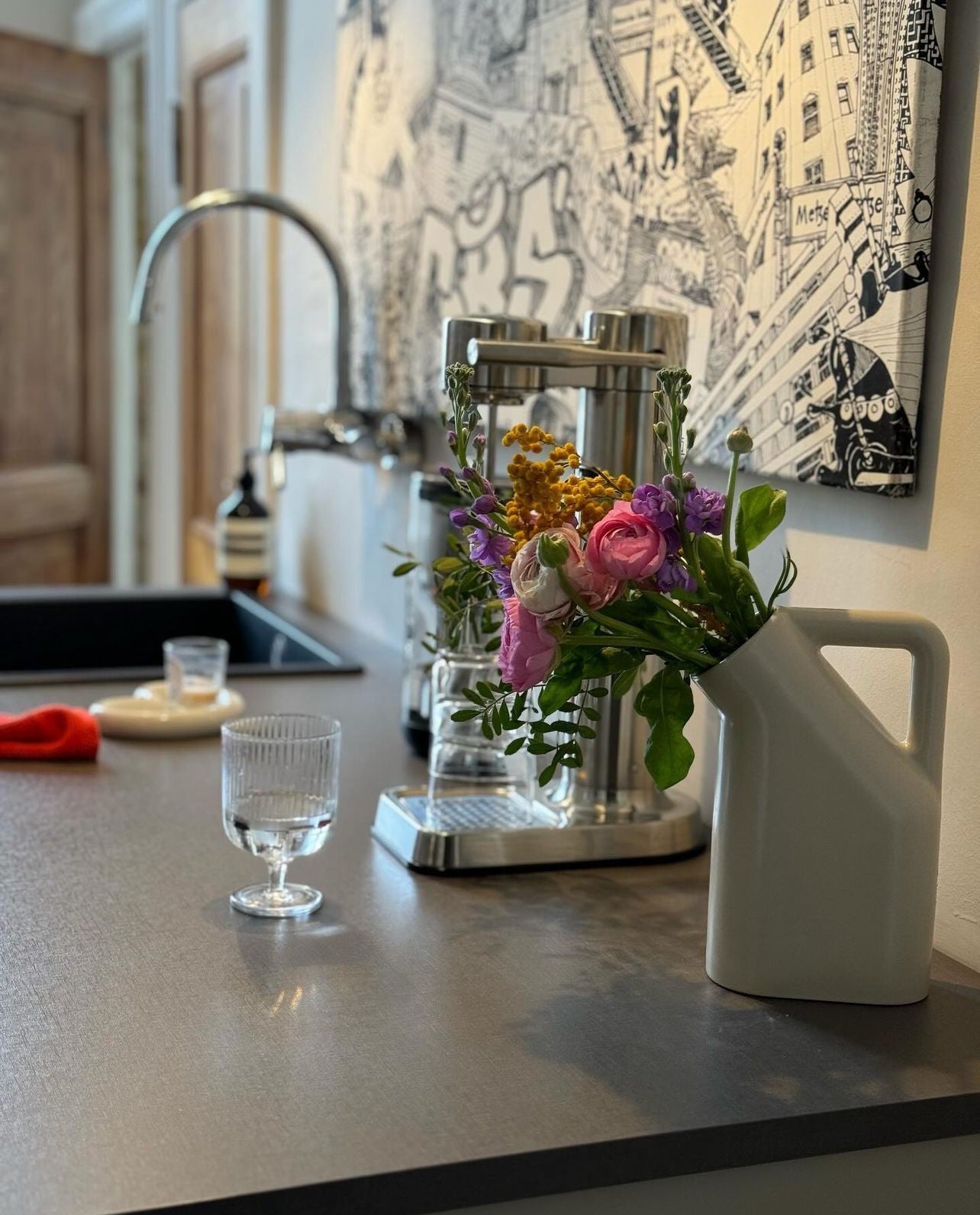 black and white detailed city sketch illustration in the kitchen with flowers, berlin skyline,