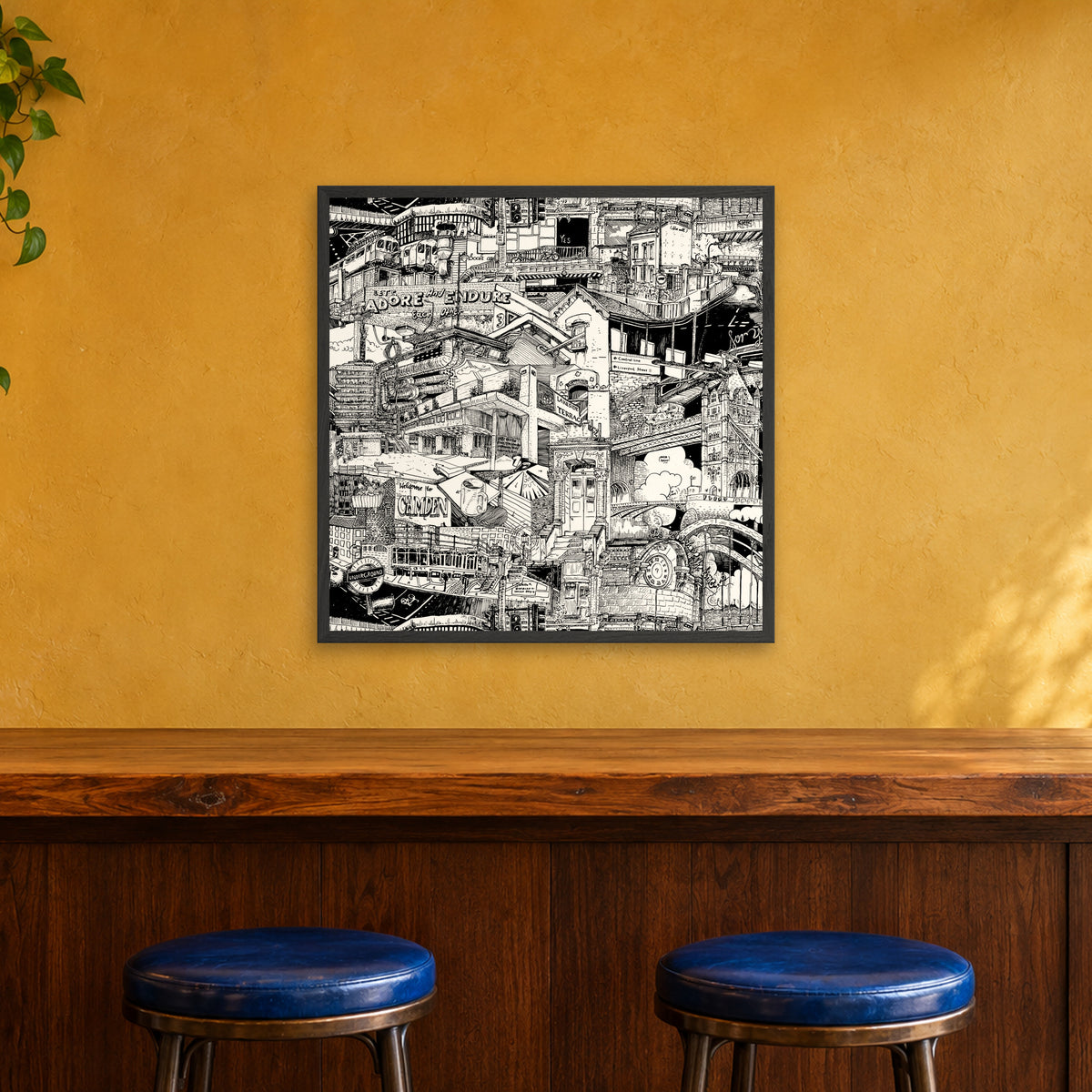 London fine art poster 70 × 70 cm in a black wood frame above the counter of a café bar