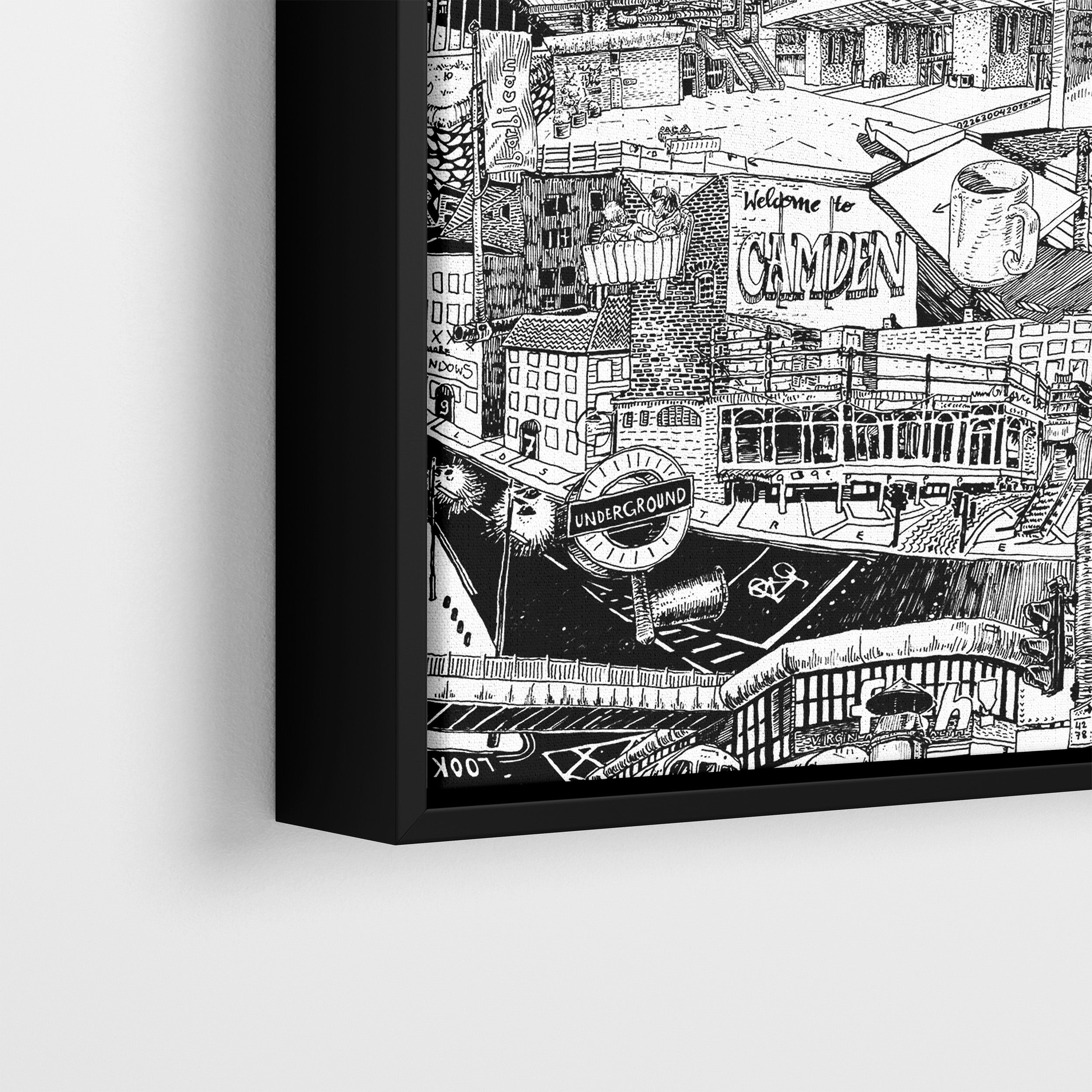 Close-up of the hand-drawn London canvas with a black frame, showcasing the iconic Underground sign, Camden City details, and the Barbican Centre. Perfect for lovers of street art and urban decor.