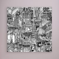 Black and white New York City canvas print on a pale pink wall, featuring urban details from Washington Square, DUMBO, Brooklyn Bridge and Manhattan streets.