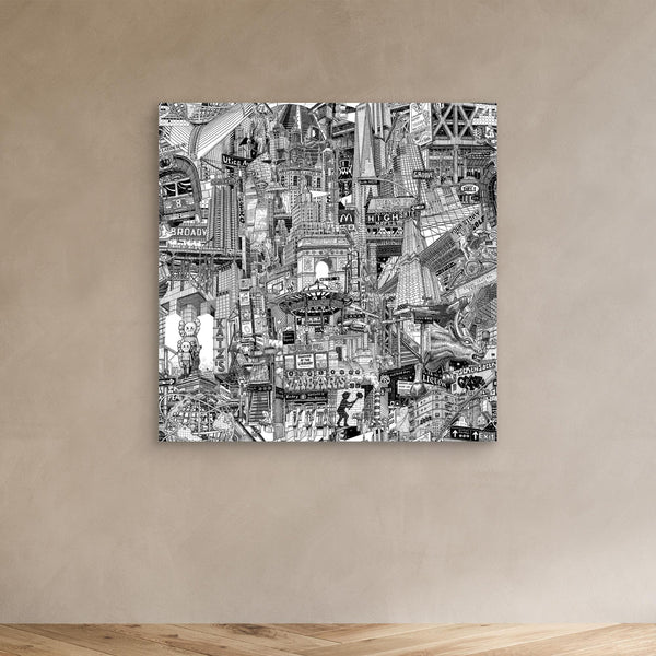 Unframed NYC canvas print on a beige wall showing black and white New York City artwork with Washington Square, Chinatown and subway sign details.