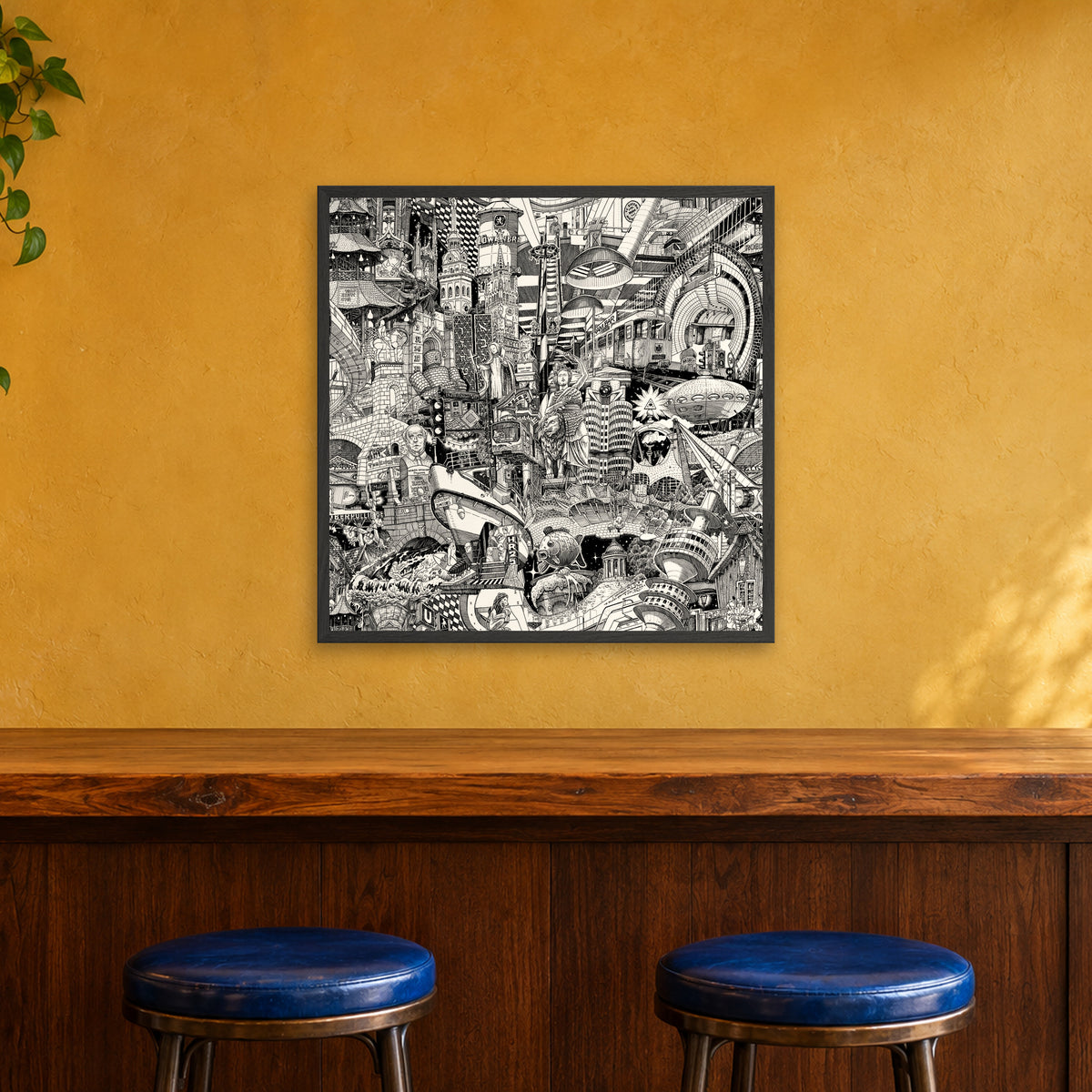 Munich fine art poster 70 × 70 cm in a black wood frame above the counter of a café bar