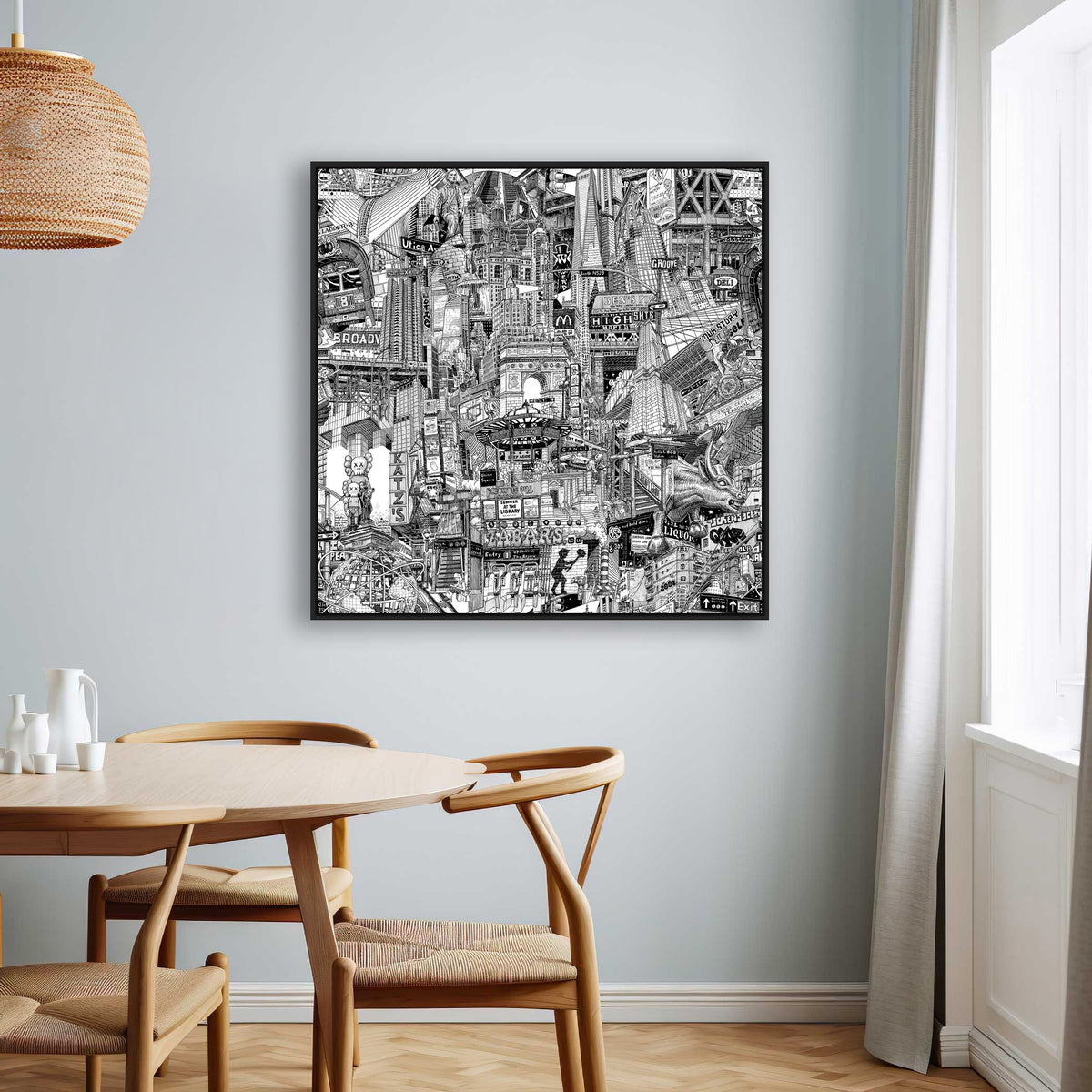 Black framed NYC canvas print on a dining room wall, shown as monochrome New York travel art with Chinatown, Union Square and subway elements.