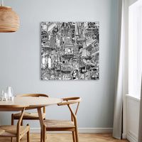 Unframed New York City canvas print on a dining room wall, featuring hand-drawn black and white city art with High Line and downtown street details.