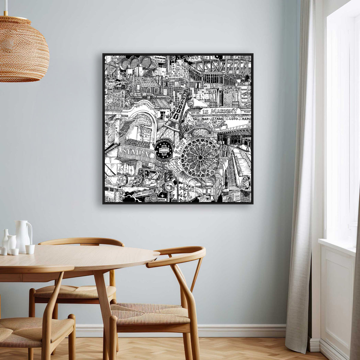 Black framed Paris city art print in a dining room, featuring hand-drawn landmarks from Montmartre rooftops to Métro signs in ink.