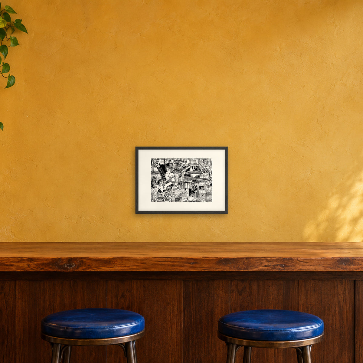 Seoul fine art poster A3 landscape in a black wood frame with white passepartout above a café bar counter