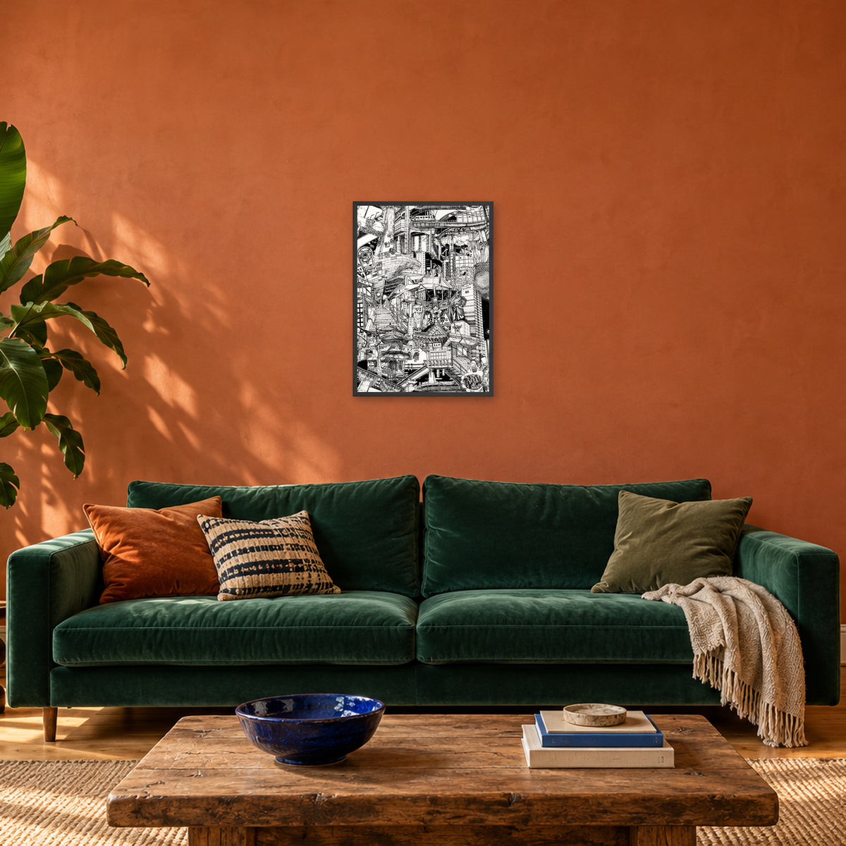 Seoul fine art poster A2 portrait in a black wood frame above a green velvet sofa in a terracotta living room