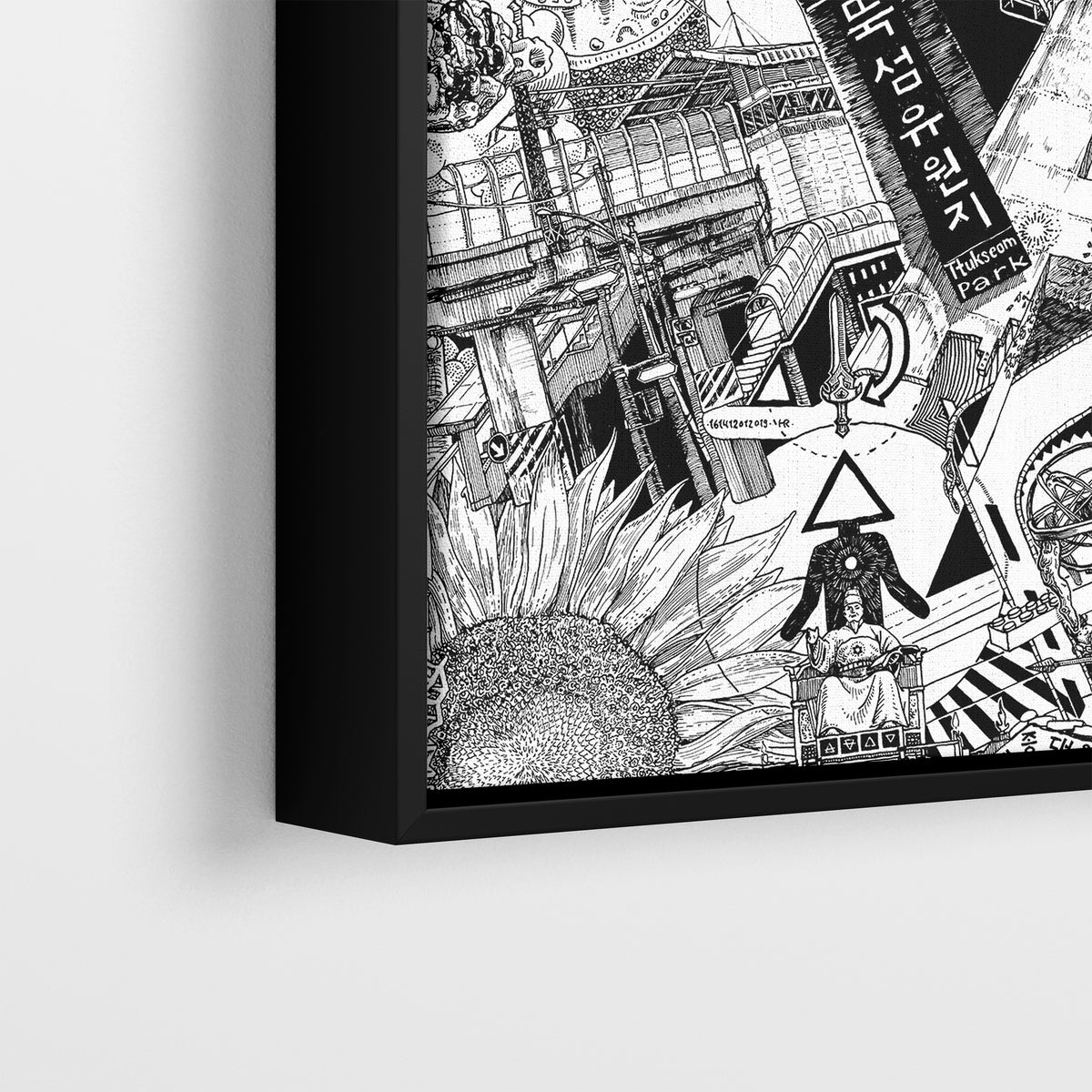 Close-up of Seoul canvas in a black frame, showcasing intricate urban art details of King Sejong statue, Korean lettering, bridges, and a sunflower.
