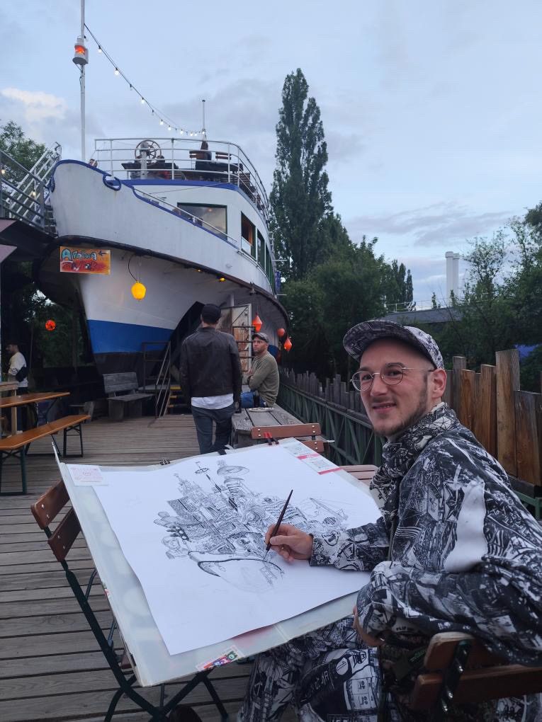 Heiner Radau drawing on location in Munich