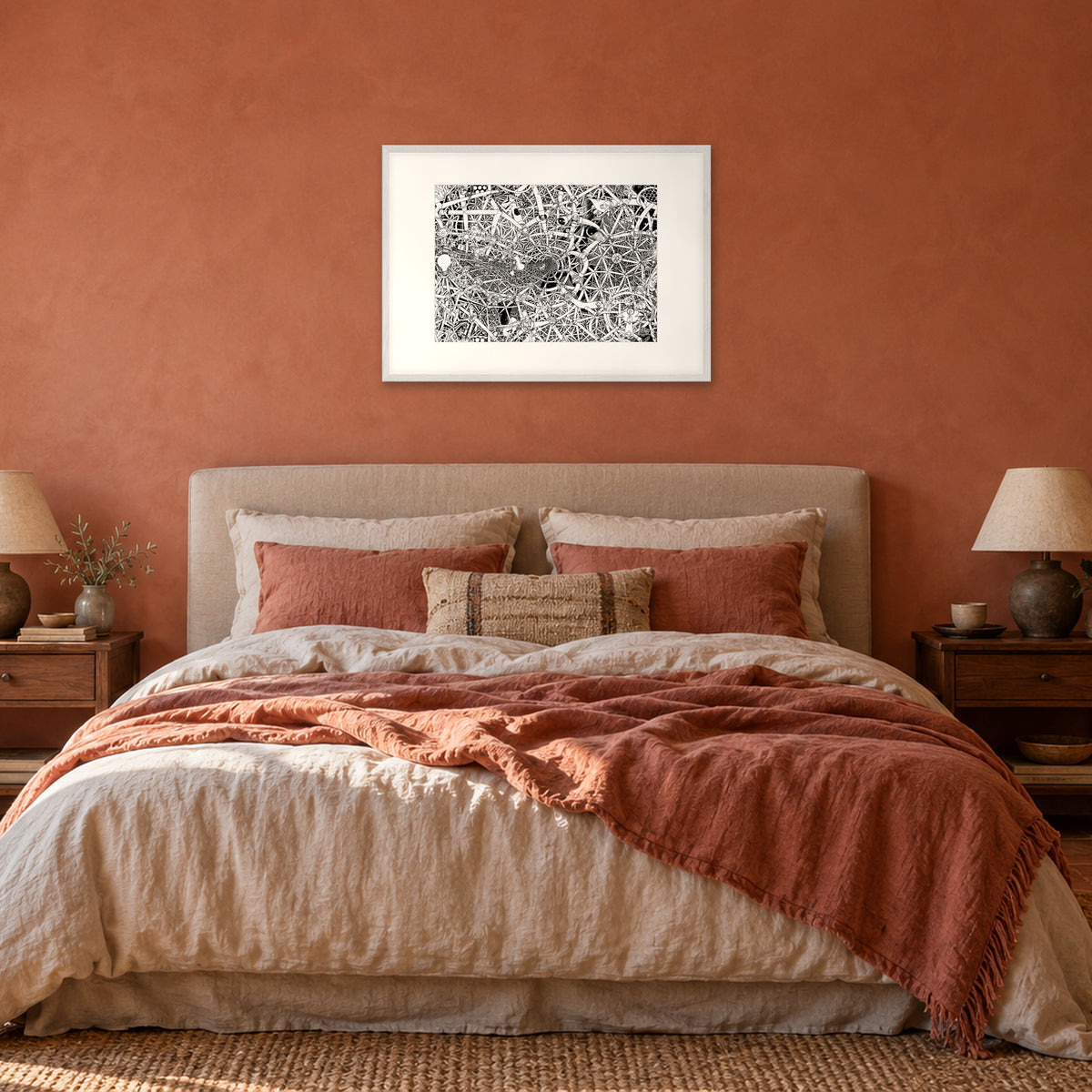 Universe fine art poster A1 landscape in a white wood frame with white passepartout above the headboard in a terracotta bedroom