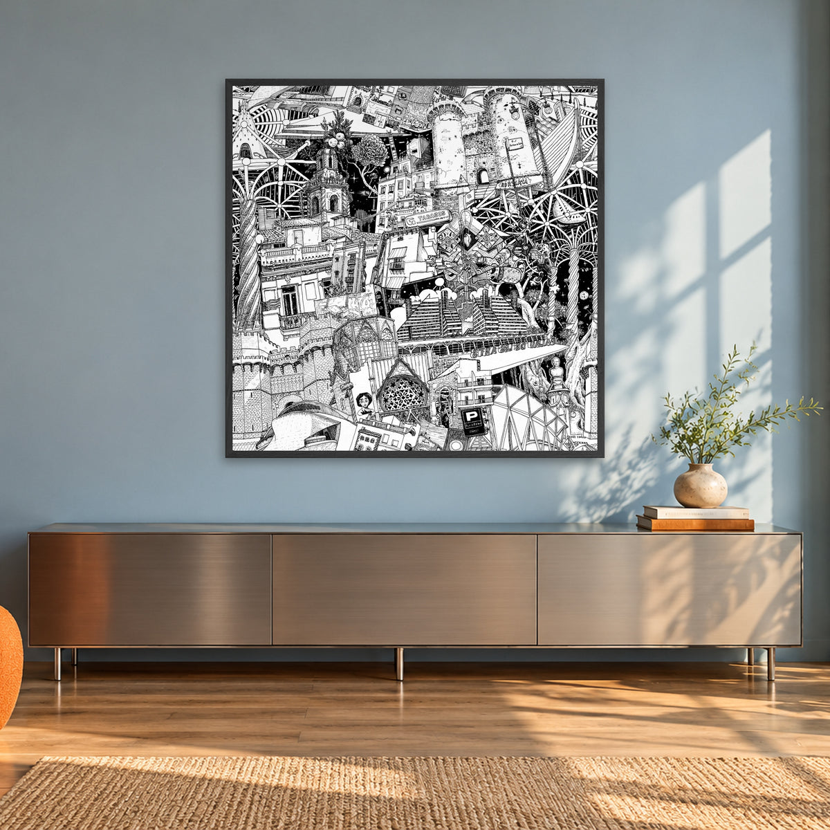 Valencia fine art poster 100 × 100 cm in a black wood frame in a sunlit loft with an orange armchair