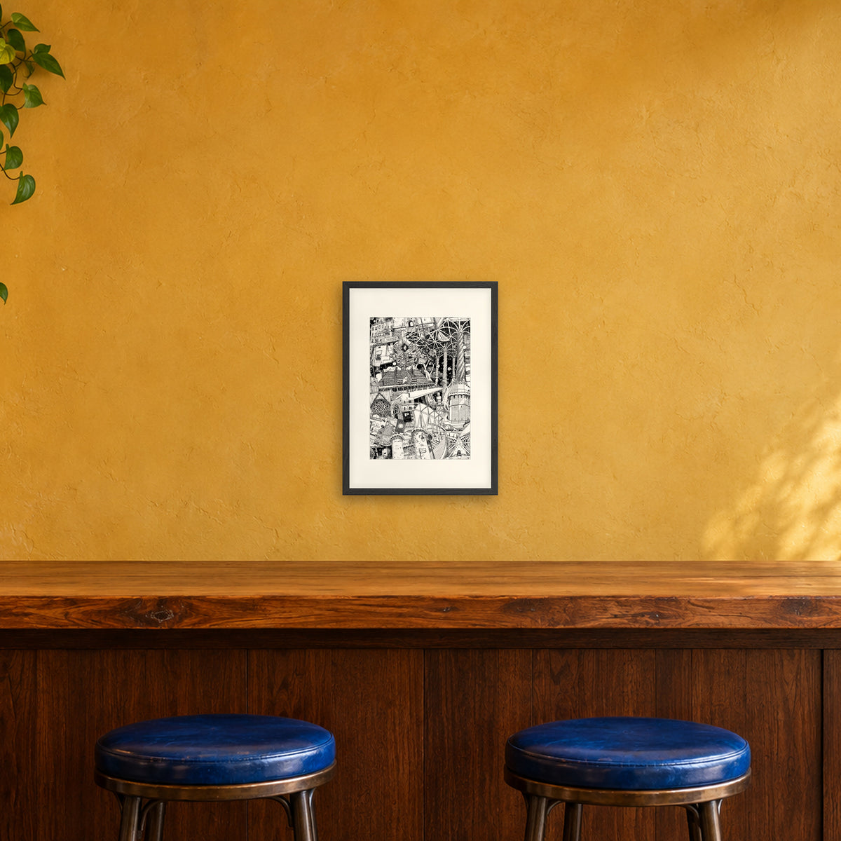 Valencia fine art poster A3 portrait in a black wood frame with white passepartout above a café bar counter